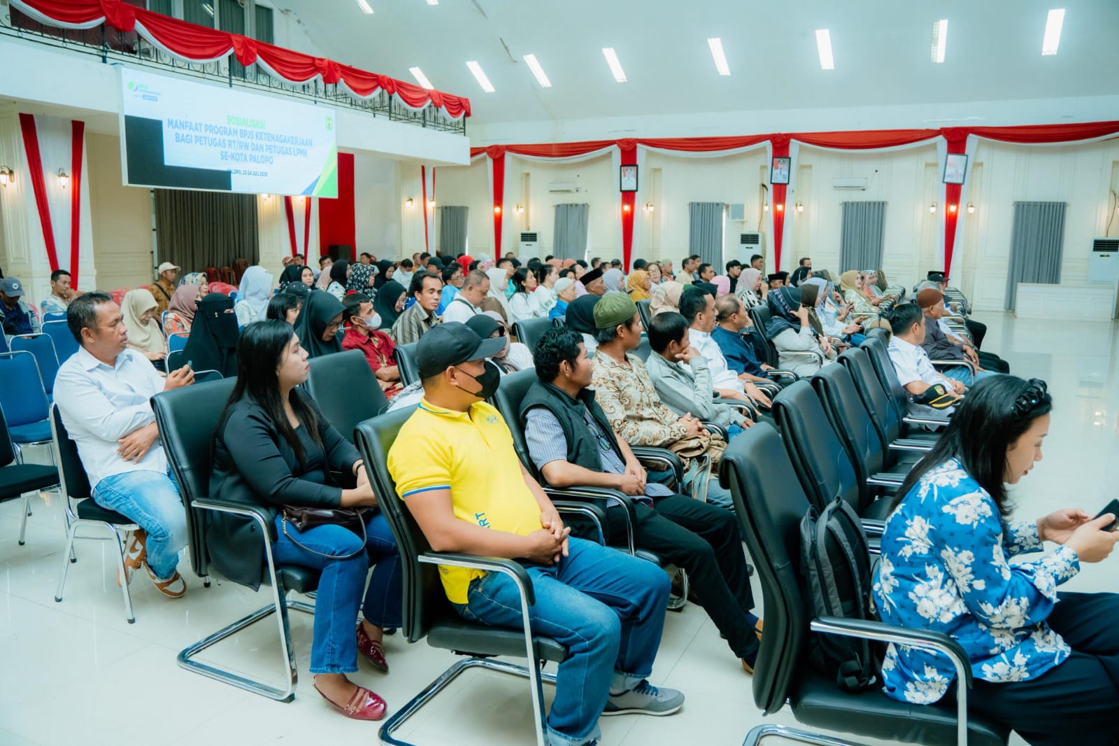 Sosialisasi Manfaat BPJS Ketenagakerjaan bagi Petugas RT/RW dan LPMK se-Kota Palopo