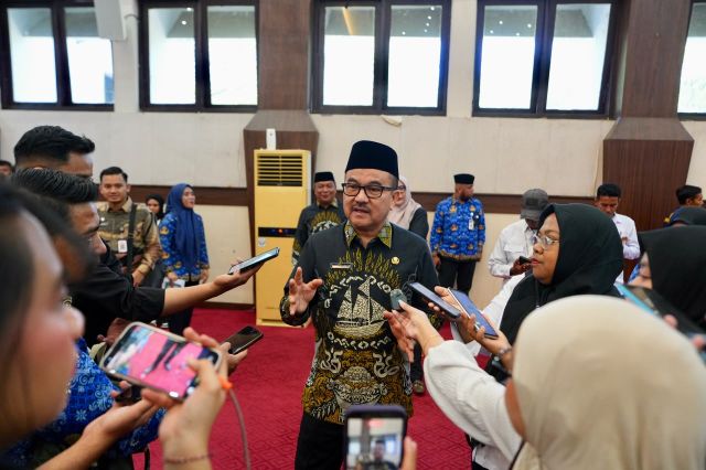 Sekda Jufri Rahman Buka Seminar Nasional dan Hadiri Pelantikan Dewan Hakim MTQ VIII KORPRI
